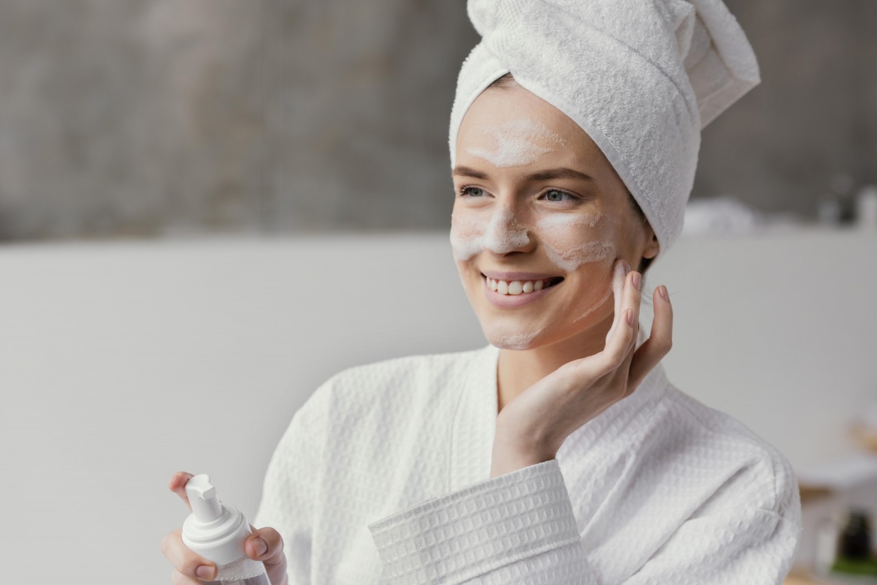 woman-using-white-face-cream